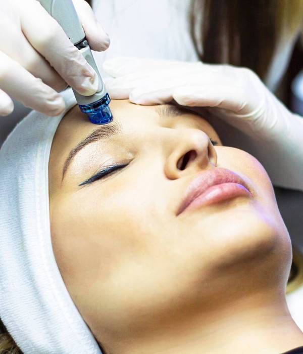 Facial cleansing procedure, deep vacuum hydro-peeling. Young woman enjoying a radiant face in a beauty salon, facial skin care cosmetology, beautician, professional beautician and freshness, clinic